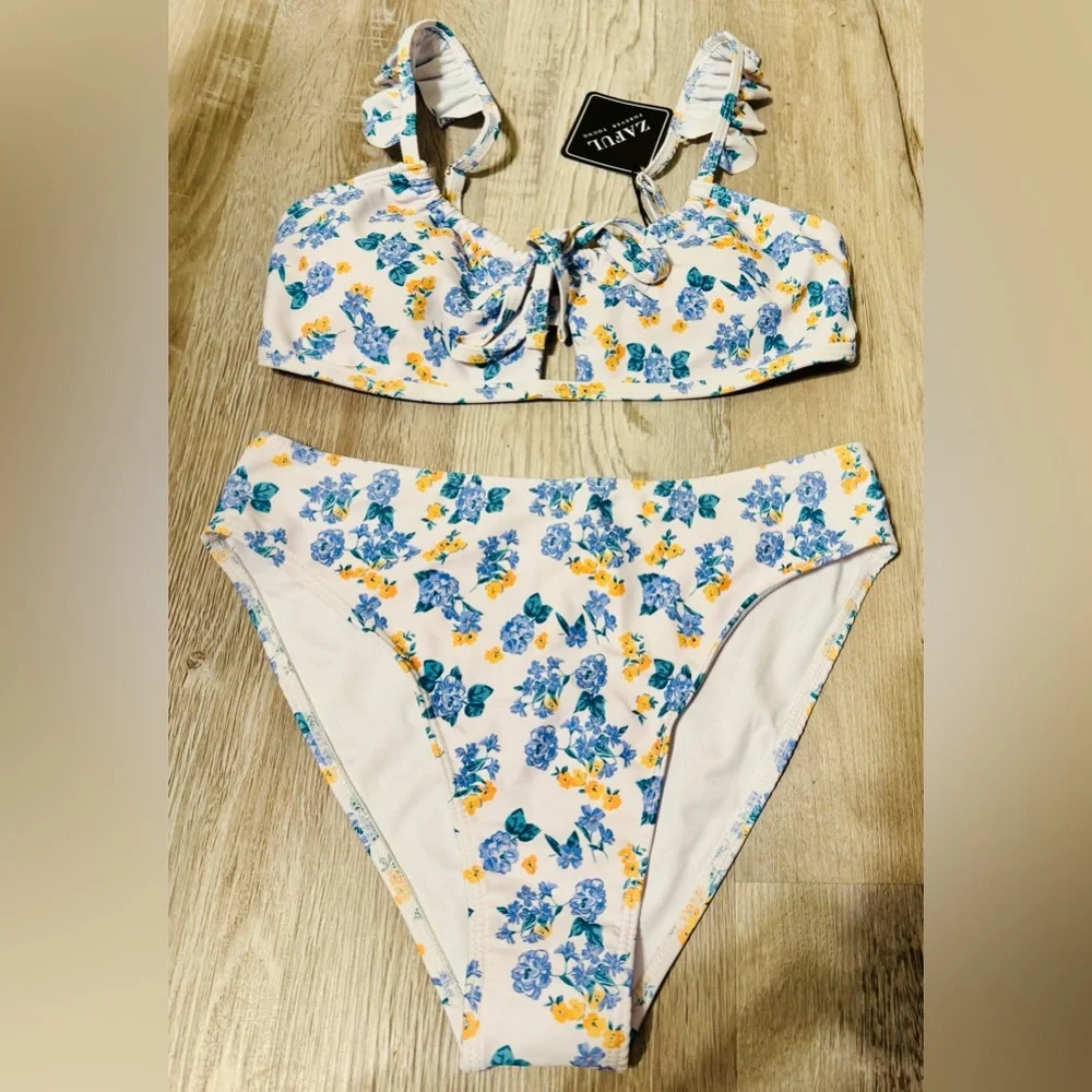 Zaful. This modern women's swimsuit, size S, features a tummy-flattering effect
